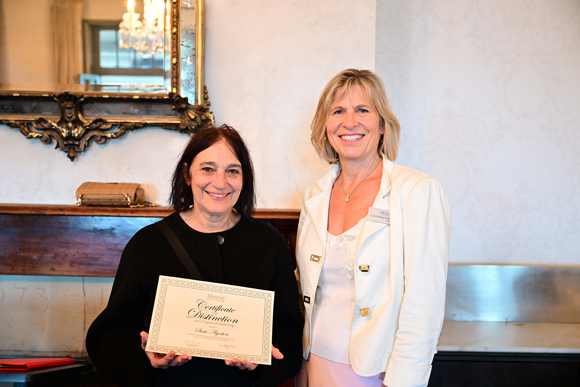 Volunteer certificate recipient with Mayor